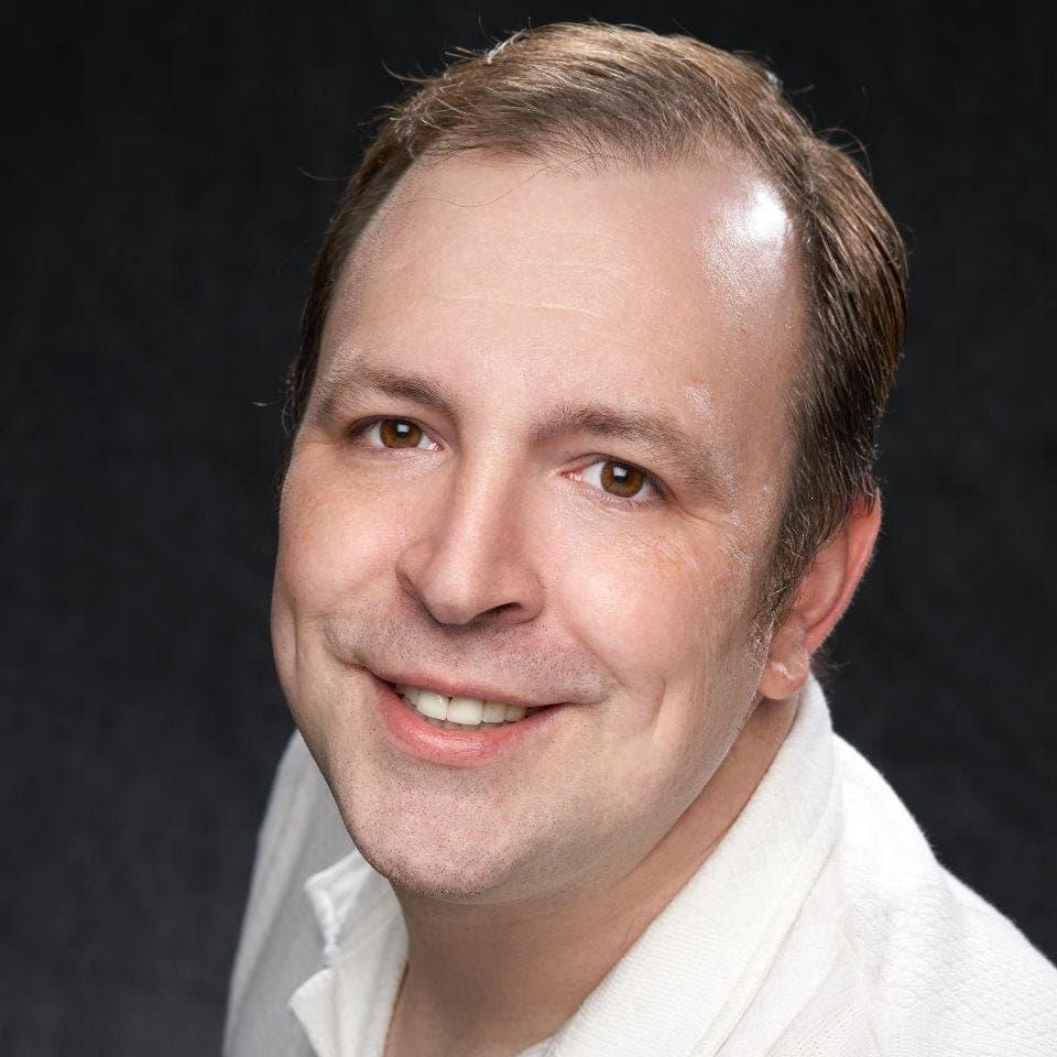 Photo of Derek Krueger
